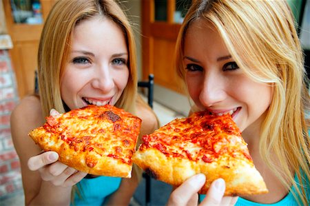 Twins Eating Pizza Stock Photo - Rights-Managed, Code: 700-00194788