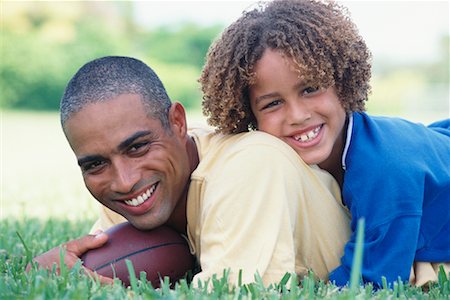 father and son playing american football pictures - Portrait of a Father and Son Stock Photo - Rights-Managed, Code: 700-00194839