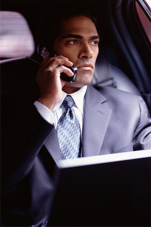 simsearch:700-00195272,k - Homme sur téléphone en limousine Photographie de stock - Rights-Managed, Code: 700-00195265