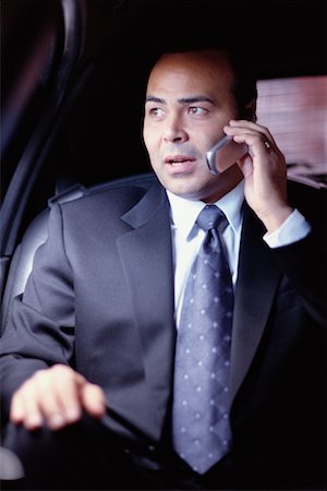 simsearch:700-00195272,k - Homme sur téléphone en limousine Photographie de stock - Rights-Managed, Code: 700-00195267