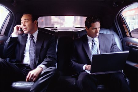 Businessmen in Back of Limousine Stock Photo - Rights-Managed, Code: 700-00195287