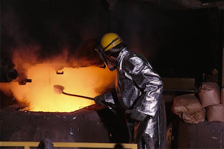 simsearch:700-03698098,k - Man Working in a Steel Mill Foto de stock - Con derechos protegidos, Código: 700-00196078