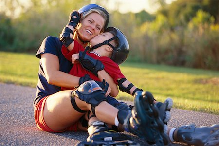 Mother Teaching Son to In-Line Skate Stock Photo - Rights-Managed, Code: 700-00196117