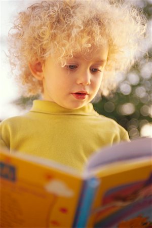 Girl Reading Book Stock Photo - Rights-Managed, Code: 700-00196139