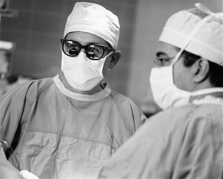 simsearch:700-00424727,k - Surgeons Fotografie stock - Rights-Managed, Codice: 700-00196360