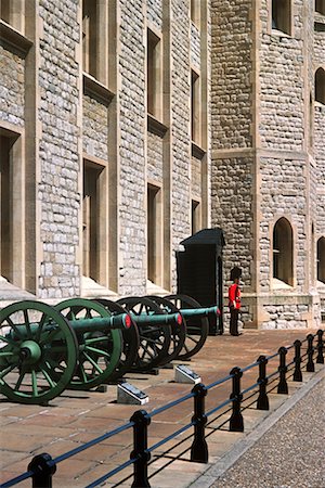 england queen guard - Tower Guard and Cannons Tower of London London, England Stock Photo - Rights-Managed, Code: 700-00196745