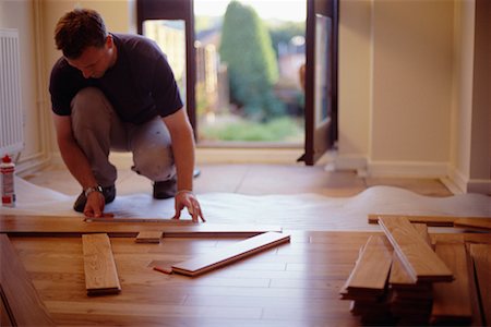 Man Installing Hardwood Floor Stock Photo - Rights-Managed, Code: 700-00197167