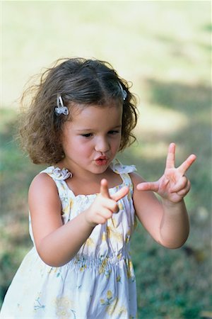 Girl Counting on Fingers Stock Photo - Rights-Managed, Code: 700-00197217