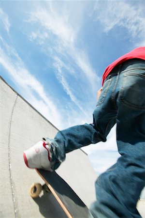 simsearch:700-03178528,k - Skateboarder on Ramp Stock Photo - Rights-Managed, Code: 700-00197320