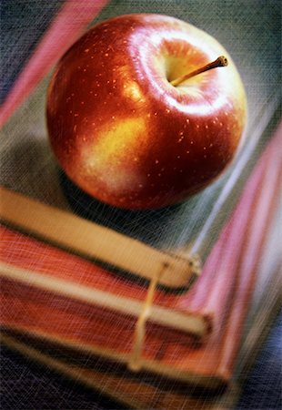 simsearch:700-00527747,k - Apple on Old School Books Stock Photo - Rights-Managed, Code: 700-00197373