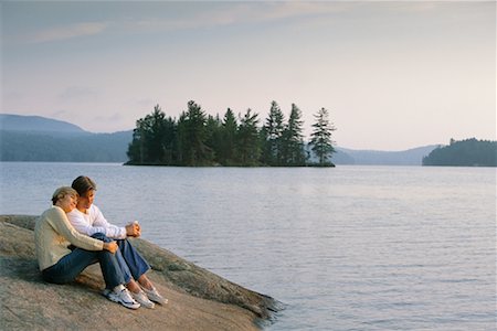 secluded lake woman - Couple by Lake Stock Photo - Rights-Managed, Code: 700-00197569