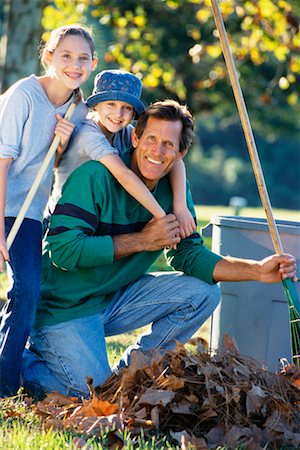 raking leaves - Family Outdoors Stock Photo - Rights-Managed, Code: 700-00197634