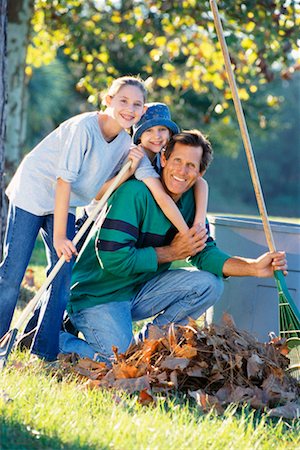 raking leaves - Family Outdoors Stock Photo - Rights-Managed, Code: 700-00197635