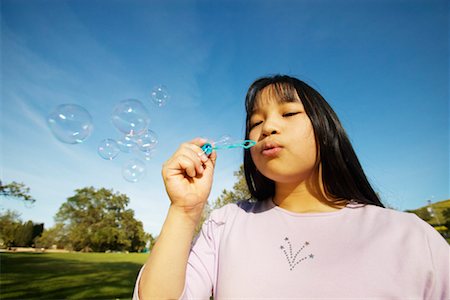 peter griffith - Girl Blowing Bubbles Stock Photo - Rights-Managed, Code: 700-00197900