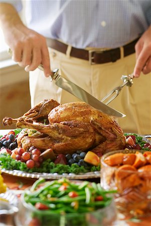 simsearch:600-00846483,k - Man Carving Turkey Stock Photo - Rights-Managed, Code: 700-00198040