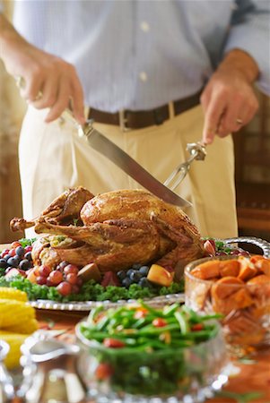 simsearch:600-00846483,k - Man Carving Turkey Stock Photo - Rights-Managed, Code: 700-00198041