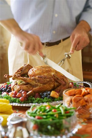 simsearch:600-00846483,k - Man Carving Turkey Stock Photo - Rights-Managed, Code: 700-00198042