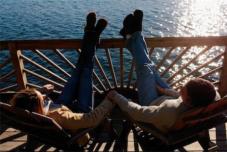 secluded lake woman - Couple Relaxing on Deck Stock Photo - Rights-Managed, Code: 700-00198396