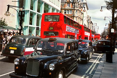 Buses and Cabs on Oxford Street London, England United Kingdom Fotografie stock - Rights-Managed, Codice: 700-00198646