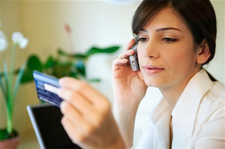 simsearch:700-00280412,k - Woman on Phone with Credit Card Stock Photo - Rights-Managed, Code: 700-00198673