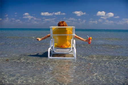 sunbathing with cocktail - Woman in Beach Chair Stock Photo - Rights-Managed, Code: 700-00199677