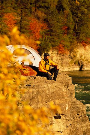 Man Camping in Autumn Stock Photo - Rights-Managed, Code: 700-00199734