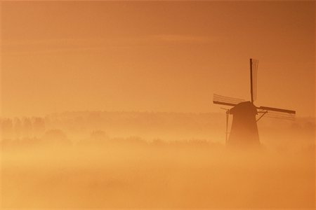 Windmill in Fog Kinderdijk, Holland Stock Photo - Rights-Managed, Code: 700-00190318