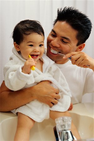 filipino family portrait - Father and Son Brushing Teeth Stock Photo - Rights-Managed, Code: 700-00190374