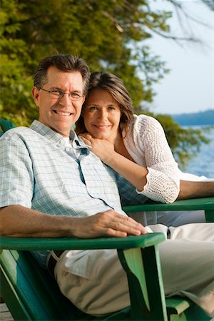 secluded lake woman - Couple in Deck Chairs by Water Stock Photo - Rights-Managed, Code: 700-00190628