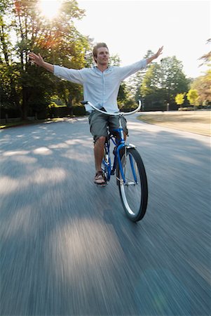 Young Man Riding Bicycle Stock Photo - Rights-Managed, Code: 700-00190679