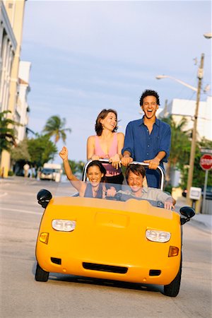 Two Couples in Small Convertible Stock Photo - Rights-Managed, Code: 700-00190805