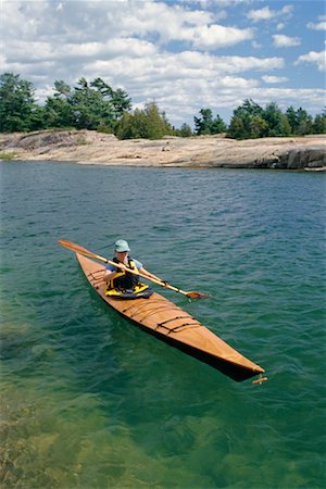 Woman Kayaking Foto de stock - Direito Controlado, Número: 700-00190838