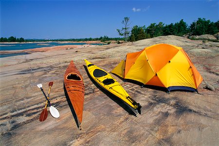 Camping and Kayaking Equipment Georgian Bay, Lake Huron Ontario, Canada Fotografie stock - Rights-Managed, Codice: 700-00190841