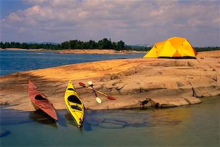 Camping and Kayaking Equipment Georgian Bay, Lake Huron Ontario, Canada Fotografie stock - Rights-Managed, Codice: 700-00190842