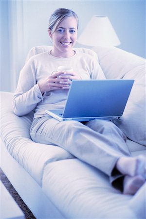 Woman Using Laptop at Home Stock Photo - Rights-Managed, Code: 700-00193418