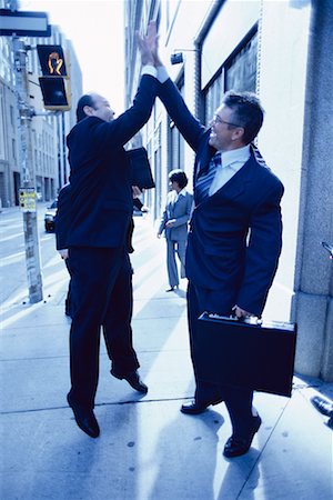 Les hommes d'affaires d'échanger High Five Photographie de stock - Rights-Managed, Code: 700-00193427