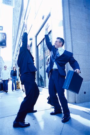 Businessmen Exchanging High Five Stock Photo - Rights-Managed, Code: 700-00193428