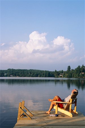 Man Sitting on Dock Stock Photo - Rights-Managed, Code: 700-00193456