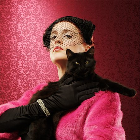 dressing up as a cat for halloween - Woman Holding Cat Stock Photo - Rights-Managed, Code: 700-00193787