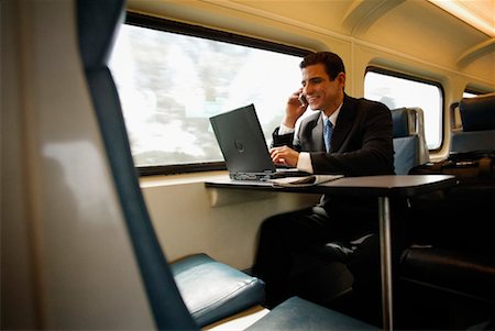 Homme d'affaires sur le Train Photographie de stock - Rights-Managed, Code: 700-00193988