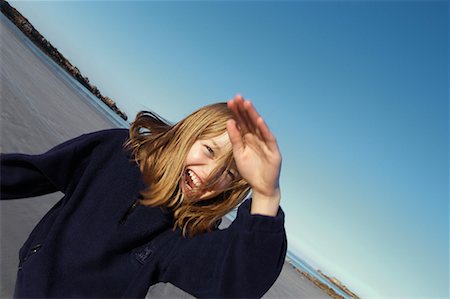 Child Practicing Karate on Beach Stock Photo - Rights-Managed, Code: 700-00268165