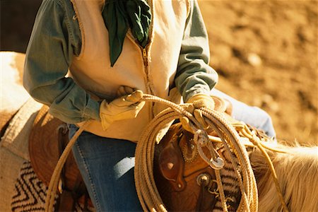 simsearch:700-00268404,k - Cowgirl Holding Lasso Stock Photo - Rights-Managed, Code: 700-00268405