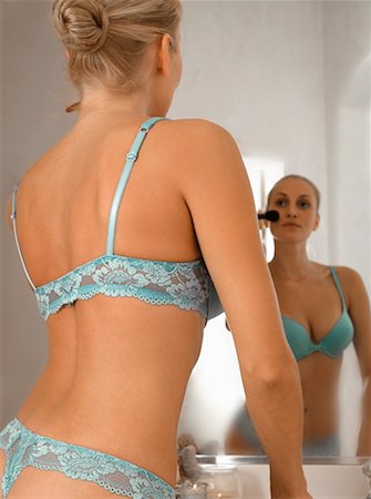Getting ready woman bra Stock Photos - Page 1 : Masterfile