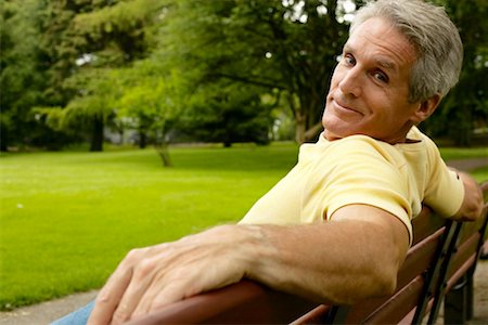 Man Sitting on Park Bench Stock Photo - Rights-Managed, Code: 700-00268748