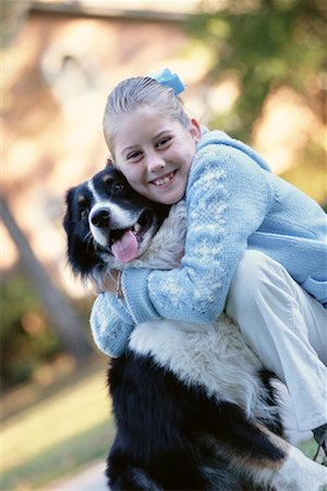 simsearch:700-00814363,k - Girl Hugging Dog Foto de stock - Con derechos protegidos, Código: 700-00268796