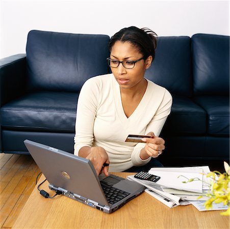 Woman Holding Credit Card, Using Laptop Computer Stock Photo - Rights-Managed, Code: 700-00269463