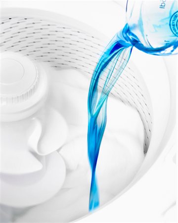 detergente - Detergent Being Poured into Washing Machine Foto de stock - Con derechos protegidos, Código: 700-00269916