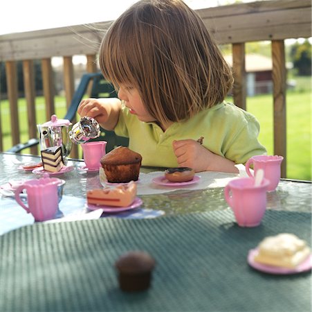 Girl Having Tea Party Stock Photo - Rights-Managed, Code: 700-00269926