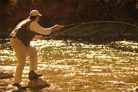 Fishing vest Stock Photos - Page 1 : Masterfile