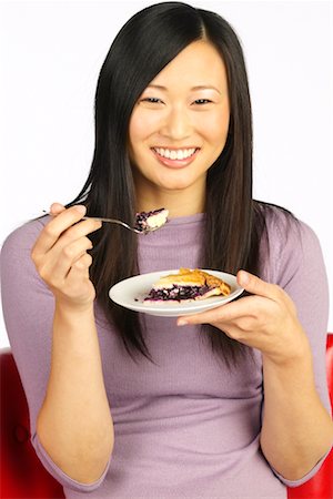Woman Holding Plate of Food Stock Photo - Rights-Managed, Code: 700-00262684
